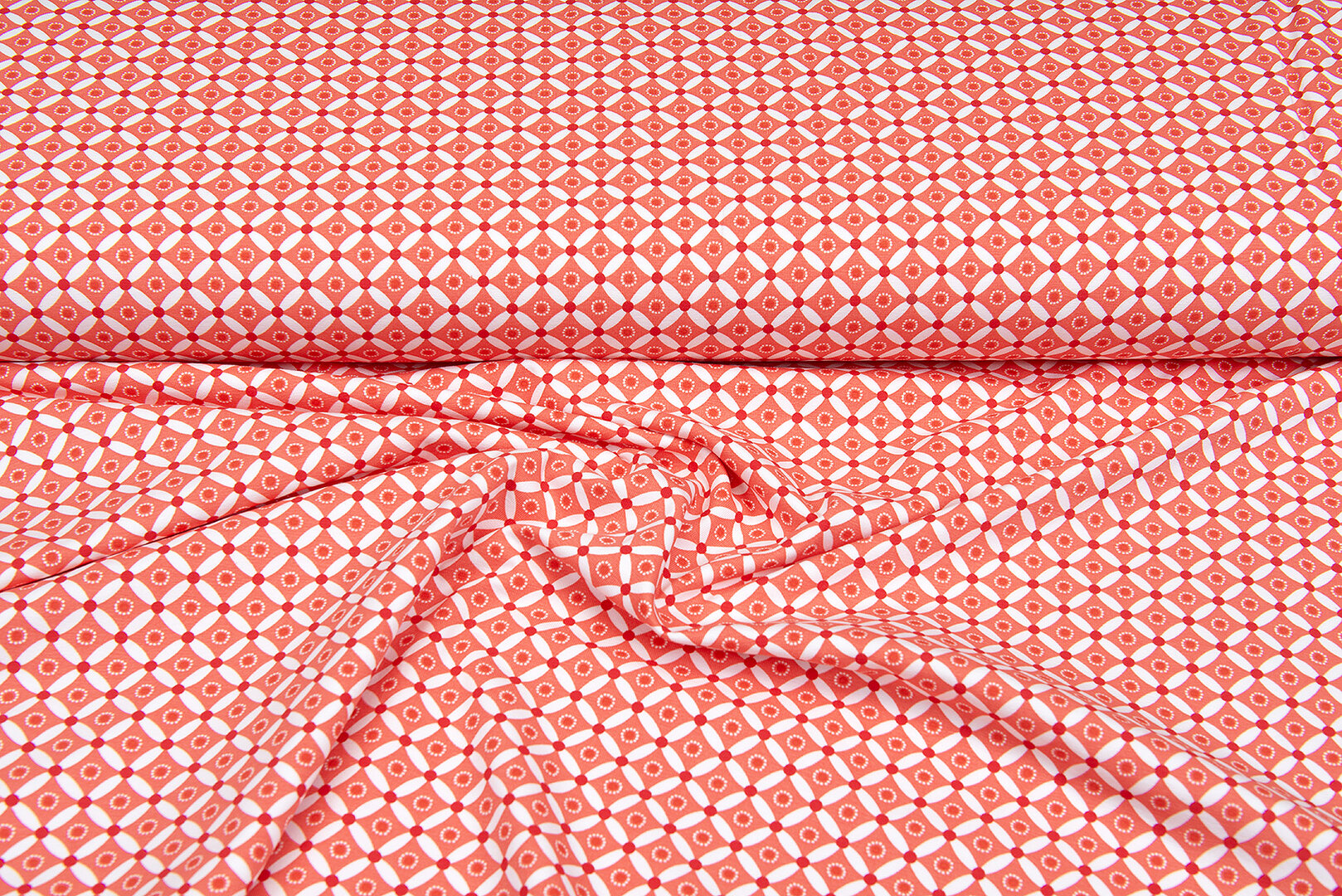Katoenen Tricot bedrukt geo dots koraalrood