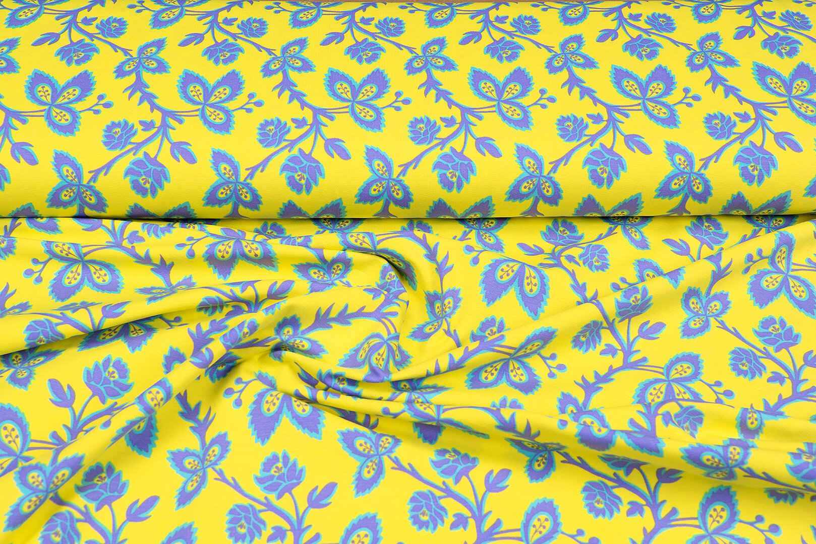 Katoenen Tricot bedrukt flowers geel-paars