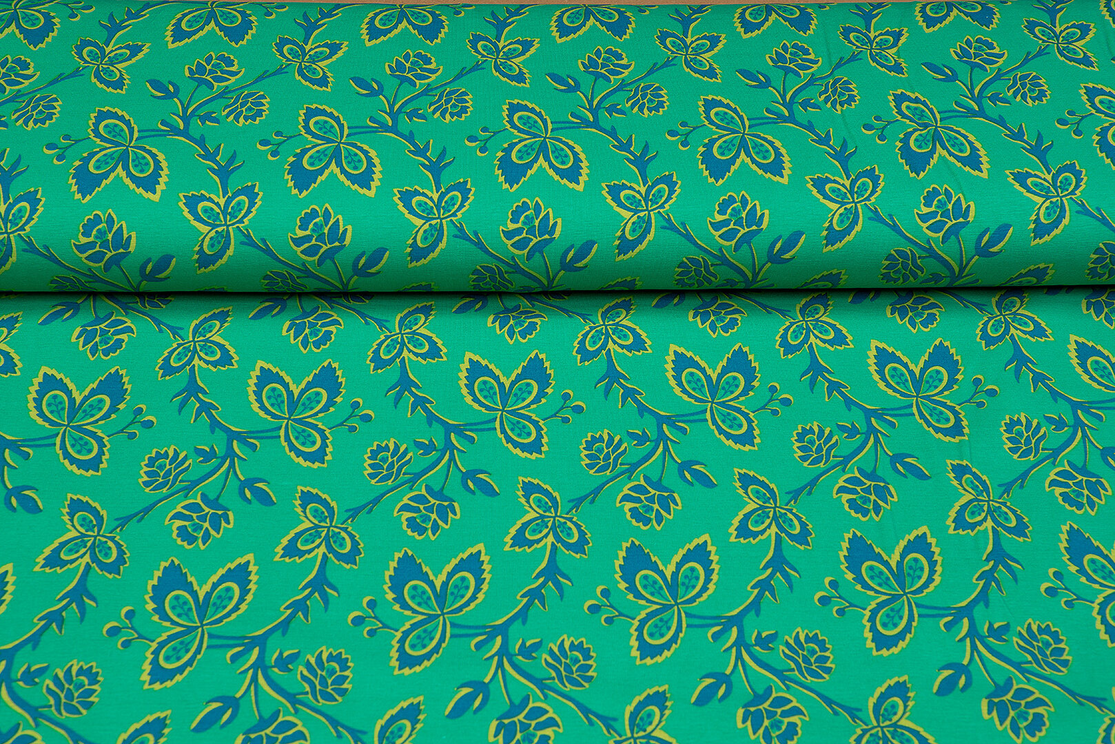 Katoenen Tricot bedrukt flowers grasgroen