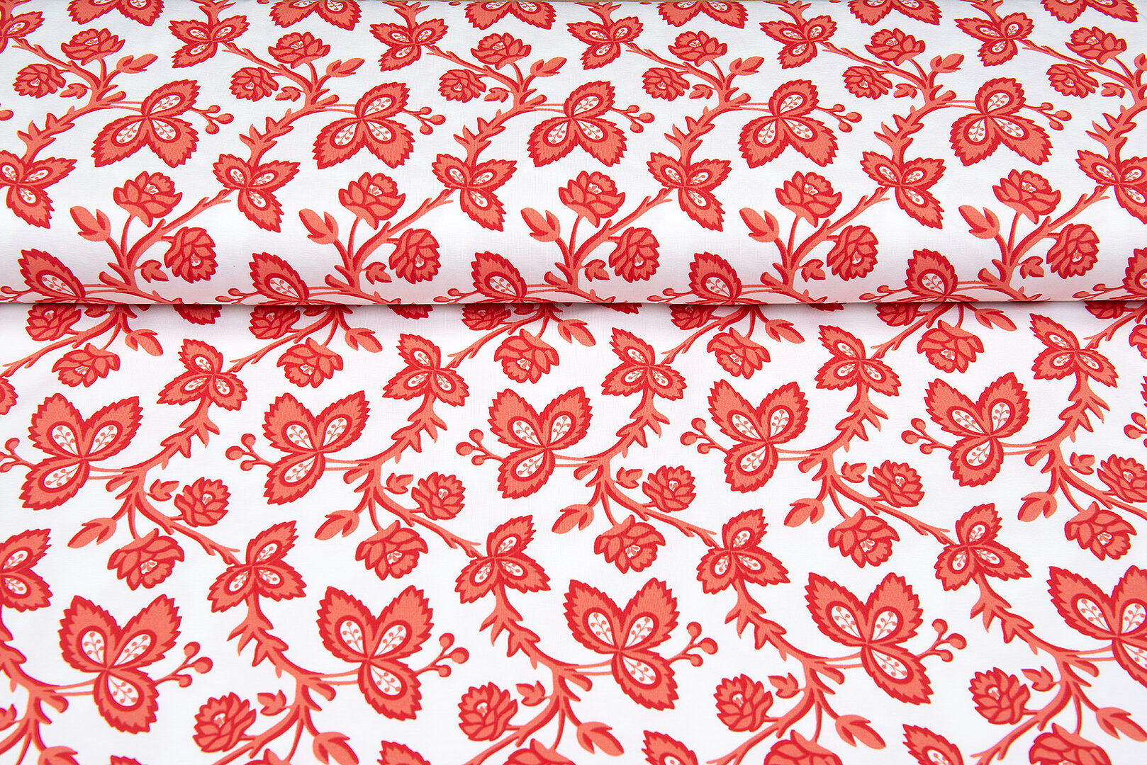 Katoenen Tricot bedrukt flowers koralrood