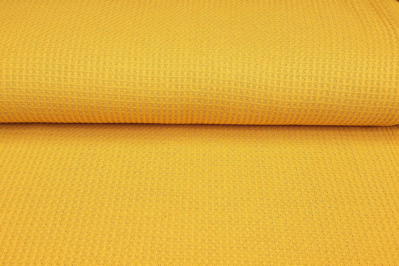 Gebreide wafel big knit okergeel