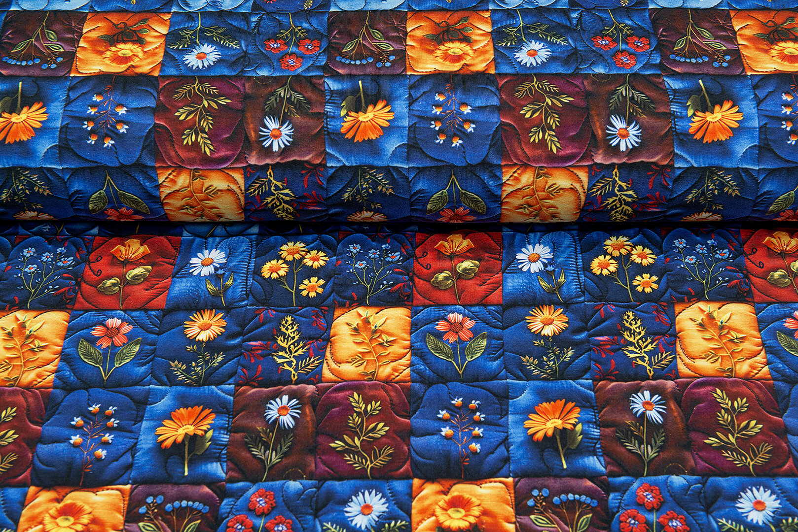 Katoenen Tricot digitaal bedrukt embroidered flower blauw-oranje