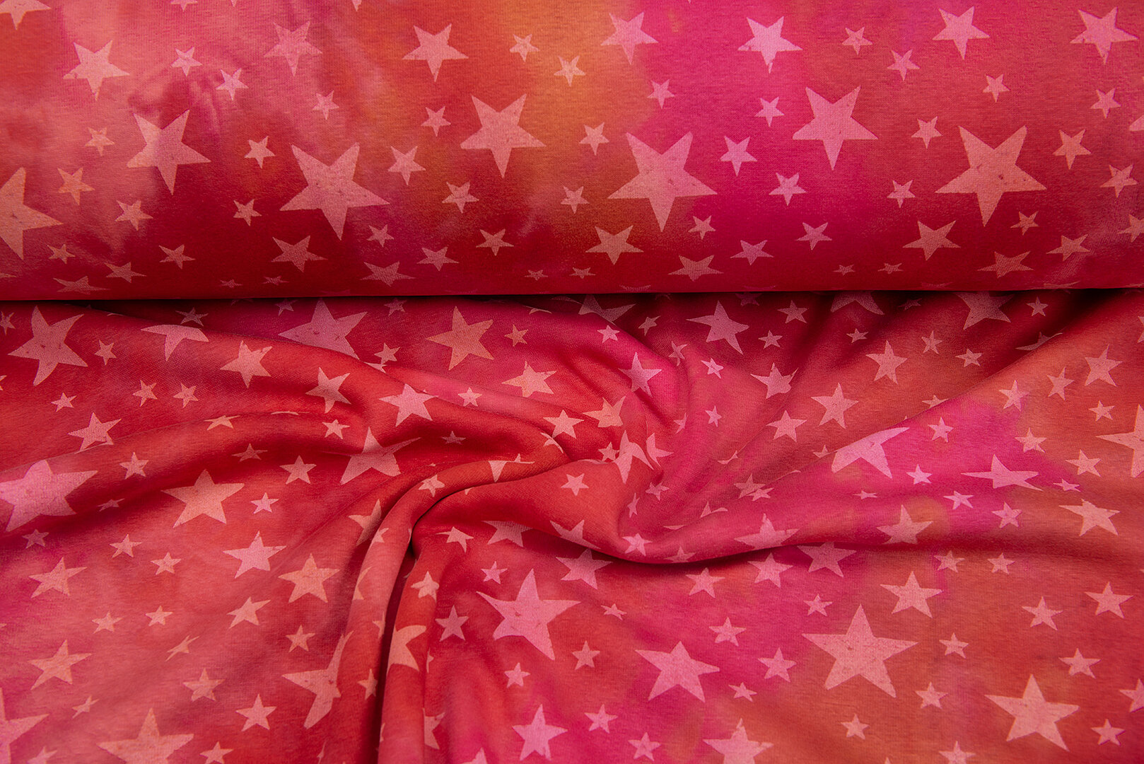 Alpenfleece Tie Dye STARS rood-oranje