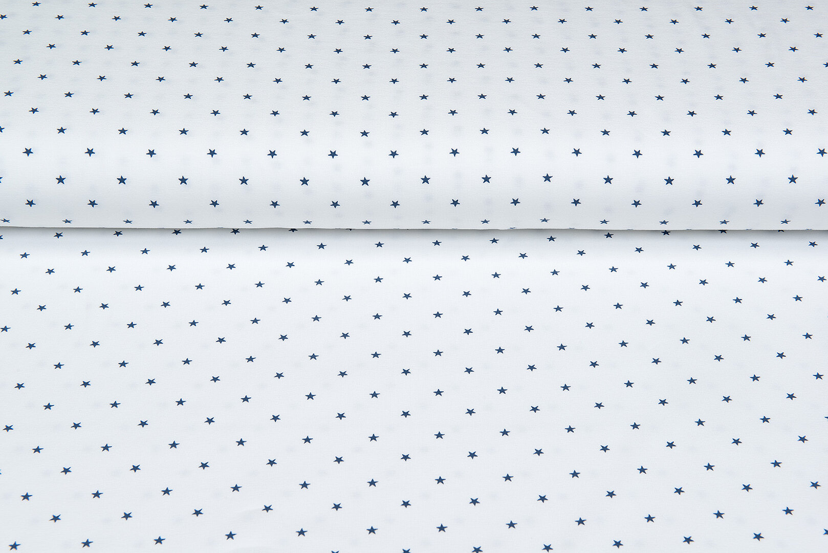 Katoenen Tricot bedrukt mini stars ecru - metaalblauw