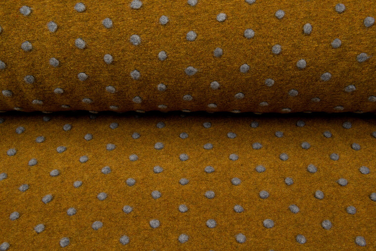 Boiled wool fluffy small dots okergeel-grijs