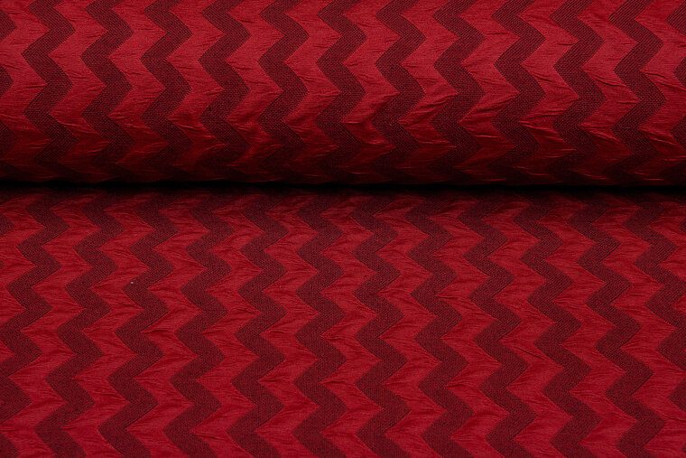 Gebreide stof zigzag rood-wijnrood