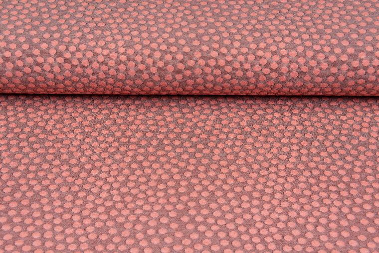 Gebreide stof dots zalmroze