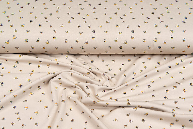 Katoenen Tricot bedrukt mini bee zand