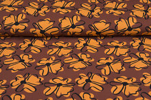 Katoenen Tricot bedrukt digitaal retro flower bruin-oranje