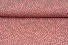 Gebreide stof dots zalmroze