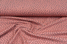 Gebreide stof dots zalmroze