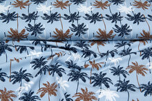 Katoenen Tricot bedrukt palm baby blauw