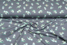 Katoenen Tricot bedrukt water colour dinos grijs