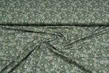 Katoenen Tricot bedrukt twigs groen