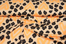 Katoenen Tricot bedrukt leopard with hearts neon oranje